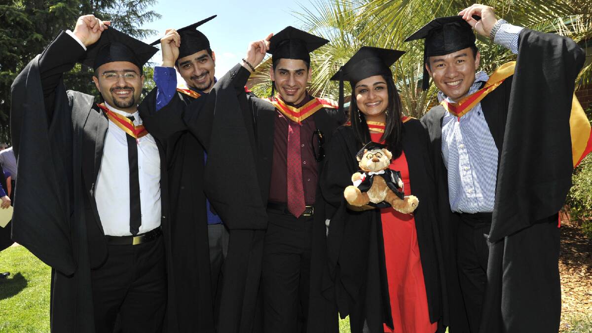 Bachelor of pharmacy graduates (from left) Kyrillos Kyrillos, Kirols Fanos, Pooja Balg and Soc Ly. Picture: Les Smith