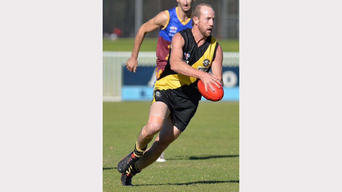 Wagga Tigers coach Tom Power looks to kick downfield. Picture: Michael Frogley