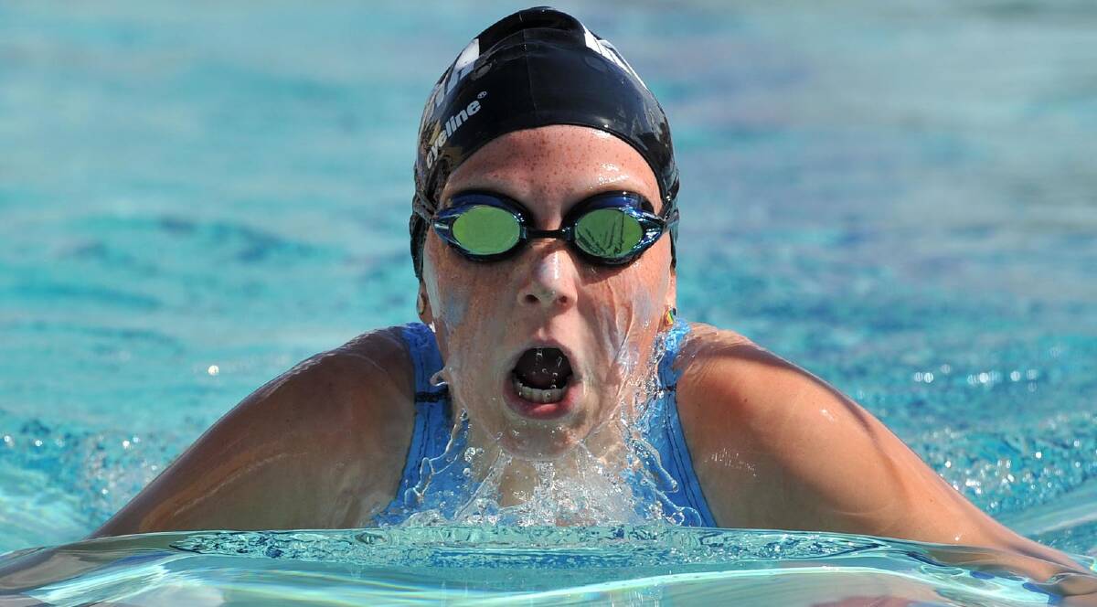 Lauren Nugent, 11, competes in a breaststroke race. Picture: Michael Frogley