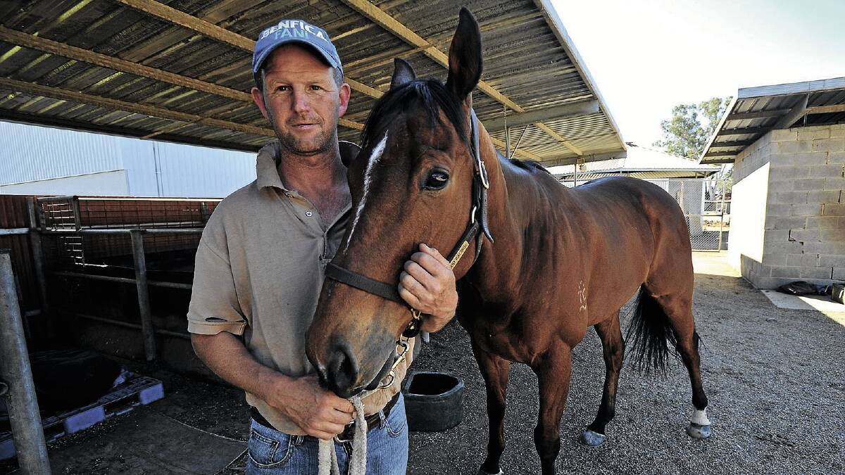  Wagga trainer Chris Heywood at the stables with newcomer Maniago yesterday. Picture: Addison Hamilton