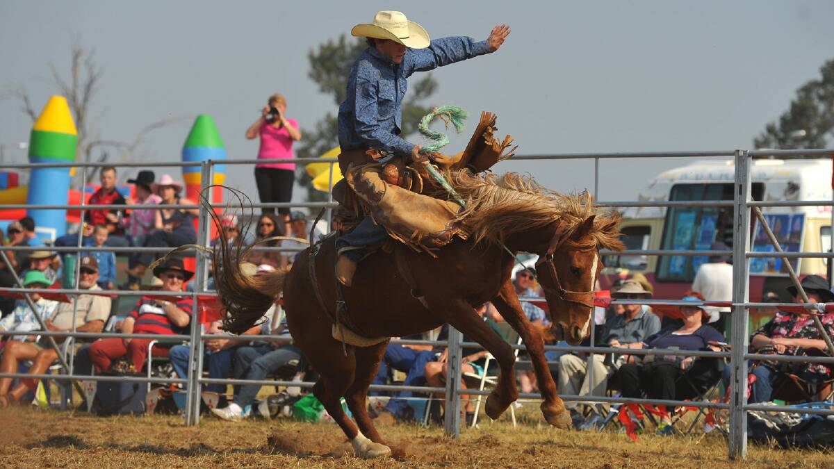 Cody Ballard in the second division bronco riding competition at the Coolamon Rodeo. Picture: Addison Hamilton
