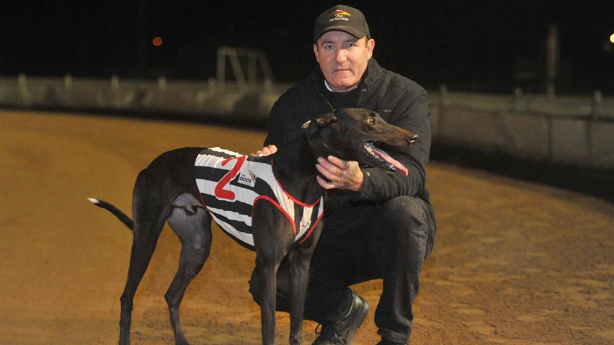 Wagga Cup winner Jimmy Lane with trainer Michael Carter. Picture: Alastair Brook