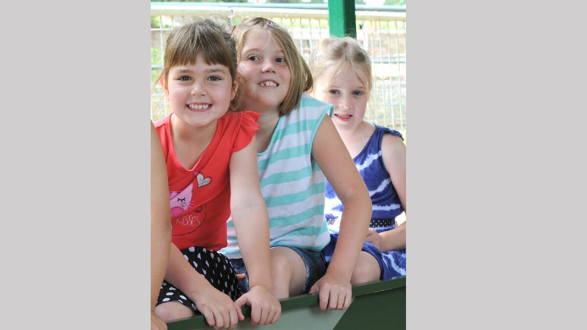 Sarah Ayton, Chloe Buchanan and Amelie Griffiths having a ride on the miniature trains at Willans Hill. Picture: Jacinta Coyne 