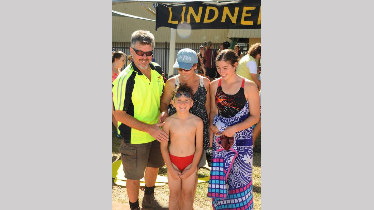 Michael and Karen Lucas with children Madeline, 17, and Samson, 8, after Samson won his 50m backstroke race.