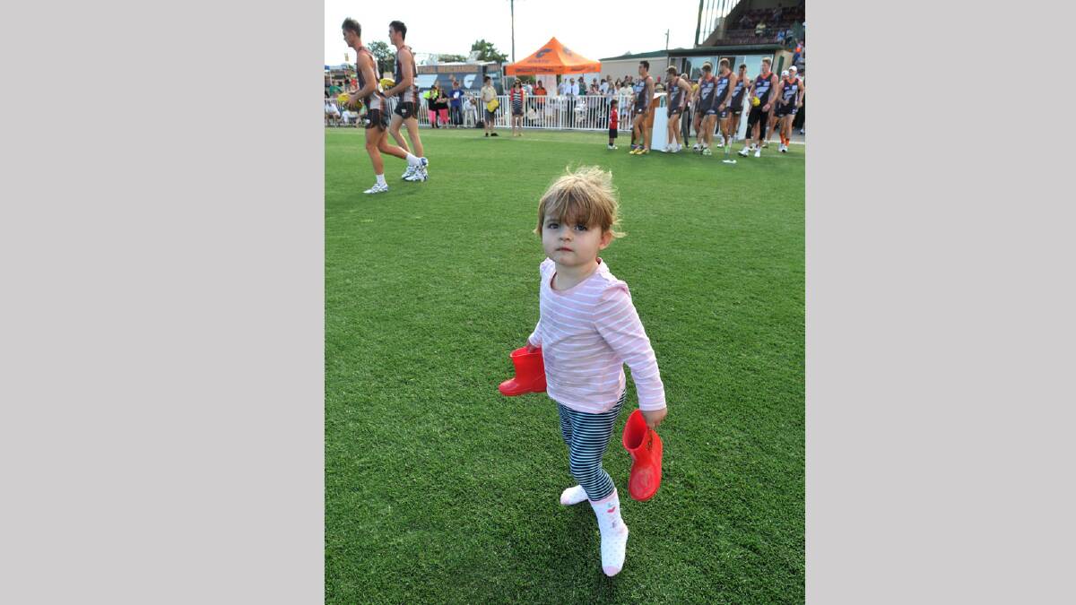 Ruby Marshman, 2, of Wagga, gets a feel for the new look Robertson Oval. Picture: Les Smith