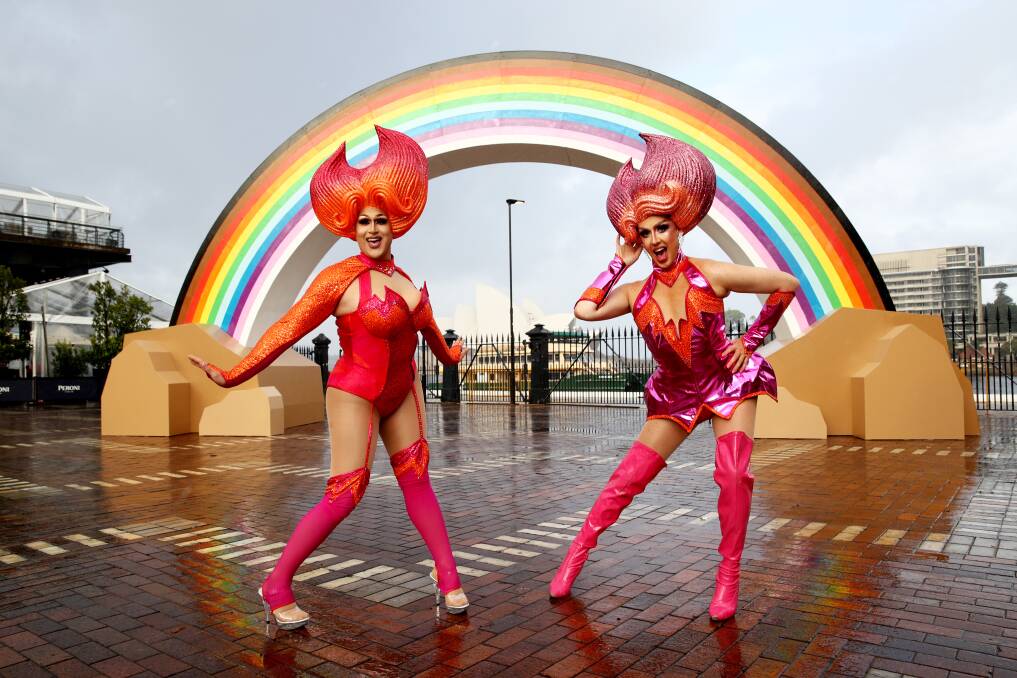 Big Rainbow and Tinder Glambassadors Danni Issues and Jimi The Kween posed in front of the rainbow in Circular Quay. Picture: Supplied 