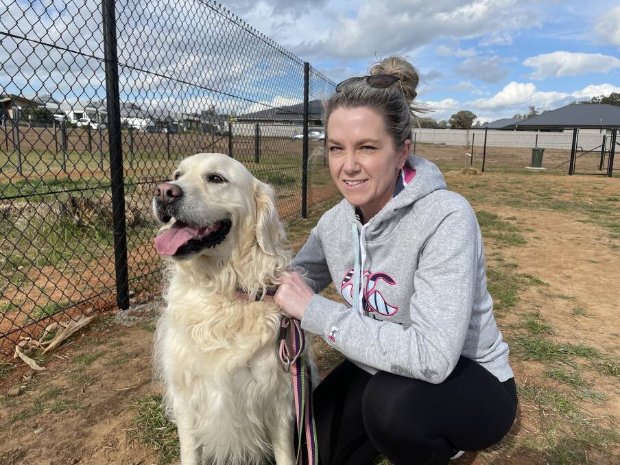 DOGGY DELIGHT: Gobba resident Shantal Armstrong and her Golden Retriever Polly are big fans of the dedicated dog park. Picture: Penny Burfitt