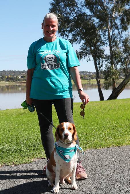 Supporters of the Riverina rescuers turned out in bandanas and polos at Lake Albert on Sunday to raise funds for the life-saving service. Pictures: Emma Hillier