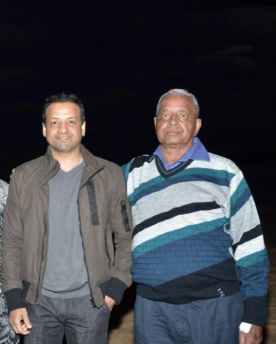 Amit Gupta pictured with his father Ramesh Gupta in Australia in 2015. Picture: Supplied
