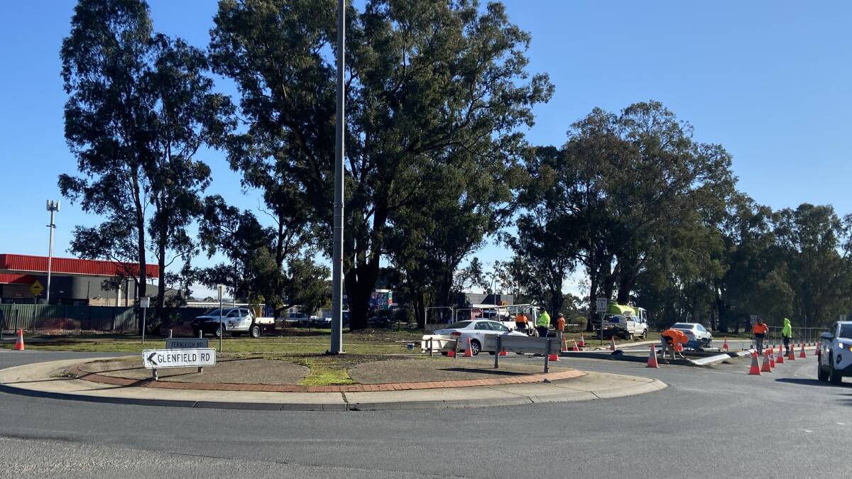 Works are underway on pedestrian islands and footpaths at the intersection of Fernleigh and Glenfield Road. Picture: Penny Burfitt