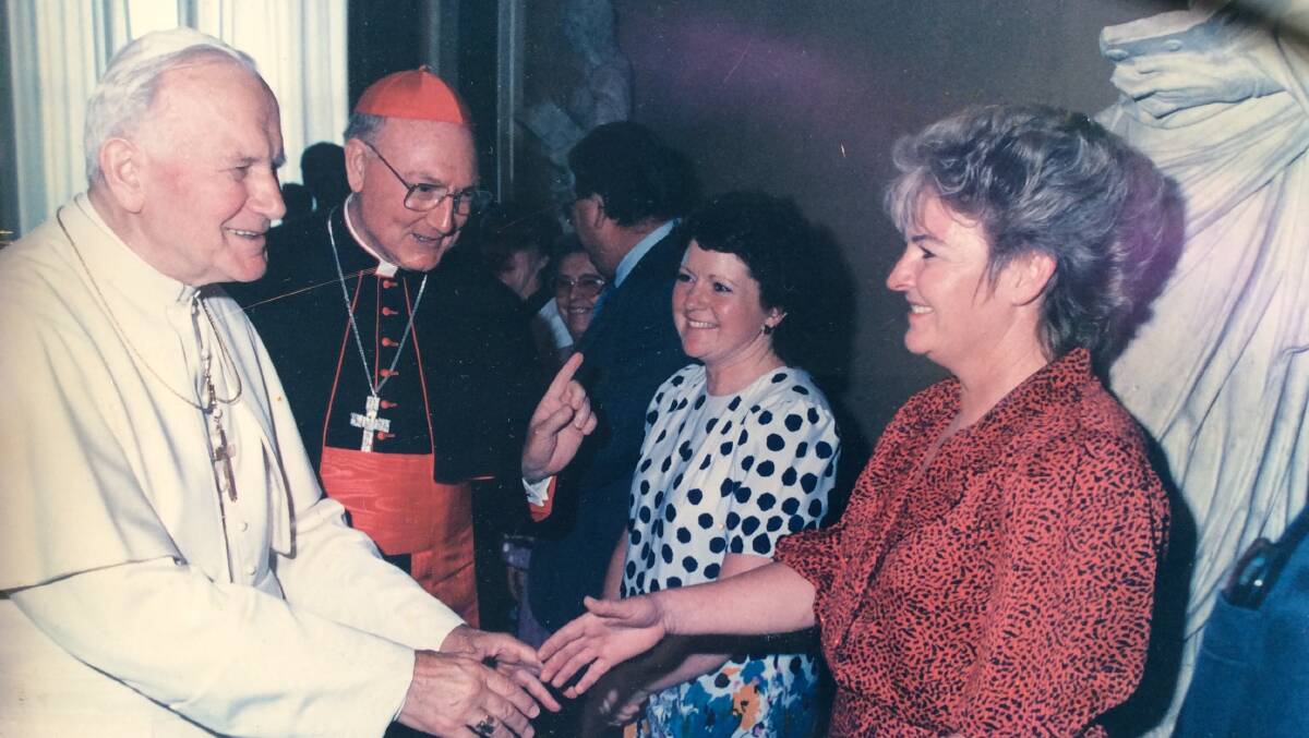 Cardinal Cassidy introduces his niece Robyn Maynard and wife of his nephew, Carol Cassidy to Pope John Paul II in 1991. Picture: Supplied