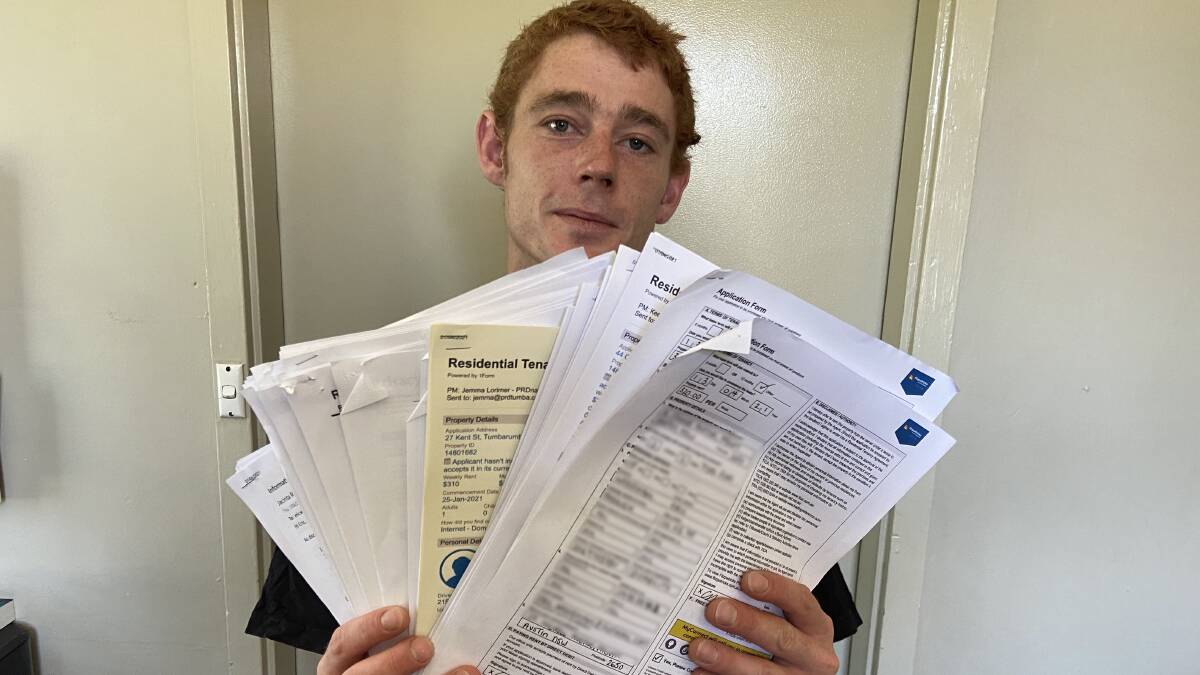 Mount Austin resident Eric Woodham shows the 20 applications he has had turned down. Picture: Penny Burfitt