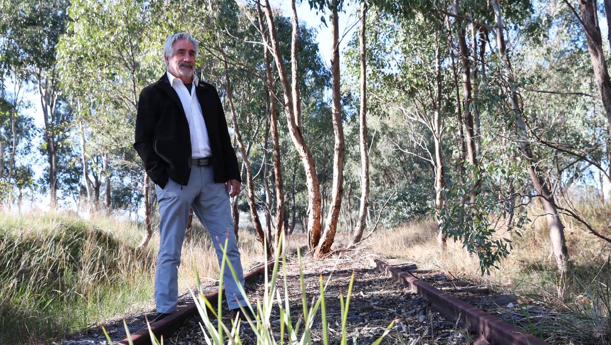 ON TRACK: Riverina Trail Inc's John Craig said the proposed rail trail that would run along this disused rail line would herald a boom for Wagga and Ladysmith. Picture: Emma Hillier