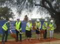 TURNING NEW GROUND: The beginning of construction on the clinical services building was celebrated with the turning of sod, as those gathered look to the future of Griffith Base Hospital. PHOTO: Cai Holroyd