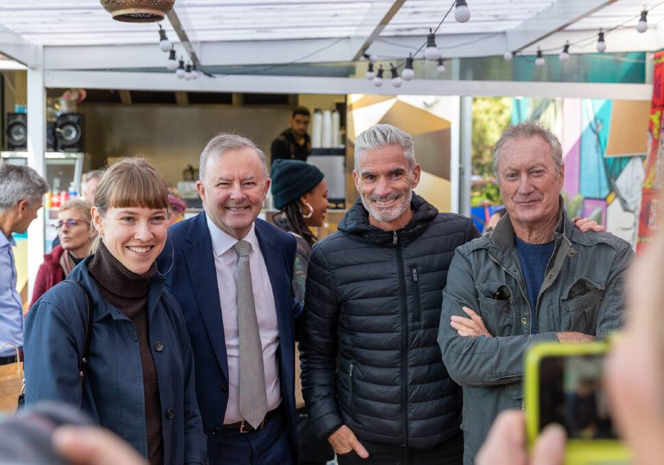 LOCAL SPIRIT: At the Addison Road Community Centre with inner westies including Craig Foster and Bryan Brown.