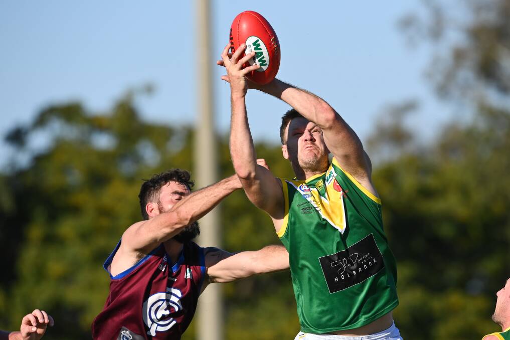HANDS OFF: Luke Gestier gets up above Culcairn's Kaden Slatter to take a mark for Holbrook on Saturday. He kicked 11 goals on his return from injury, eight of which came in one quarter. Picture: Mark Jesser