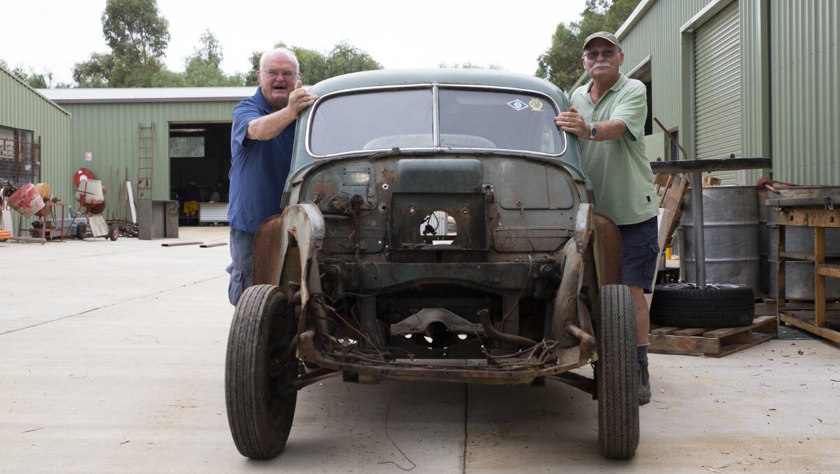Rick Priest with John Killalea and a Morris Minor that will be up for auction on Saturday. Picture: Madeline Begley