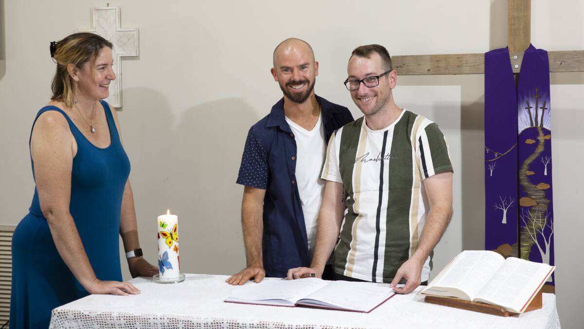 Jeremy Webb and Michael Slack say they're thrilled to have found minister Yvonne Ghavalas at the Pilgrim Uniting Church, where their wedding will be held on Saturday. Picture: Madeline Begley