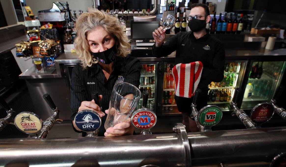 WAITING GAME: Thomas Blamey Tavern manager Michelle Staunton and staff member Kane Salamon are hoping for a weekend reopening if the Riverina is lifted out of lockdown. Picture: Les Smith