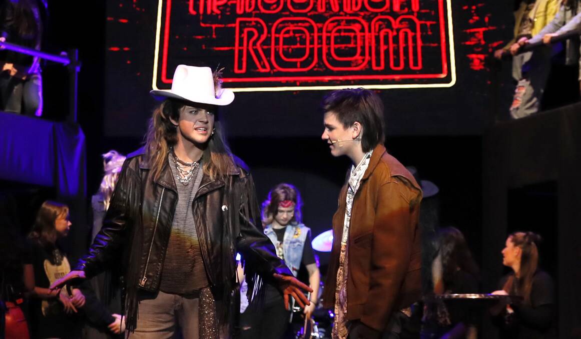 ROCKING OUT: Year 12 student Kynan Cooper (left) plays celebrity rockstar Stacee Jaxx in Mater Dei Catholic College's production of Rock of Ages. Picture: Les Smith