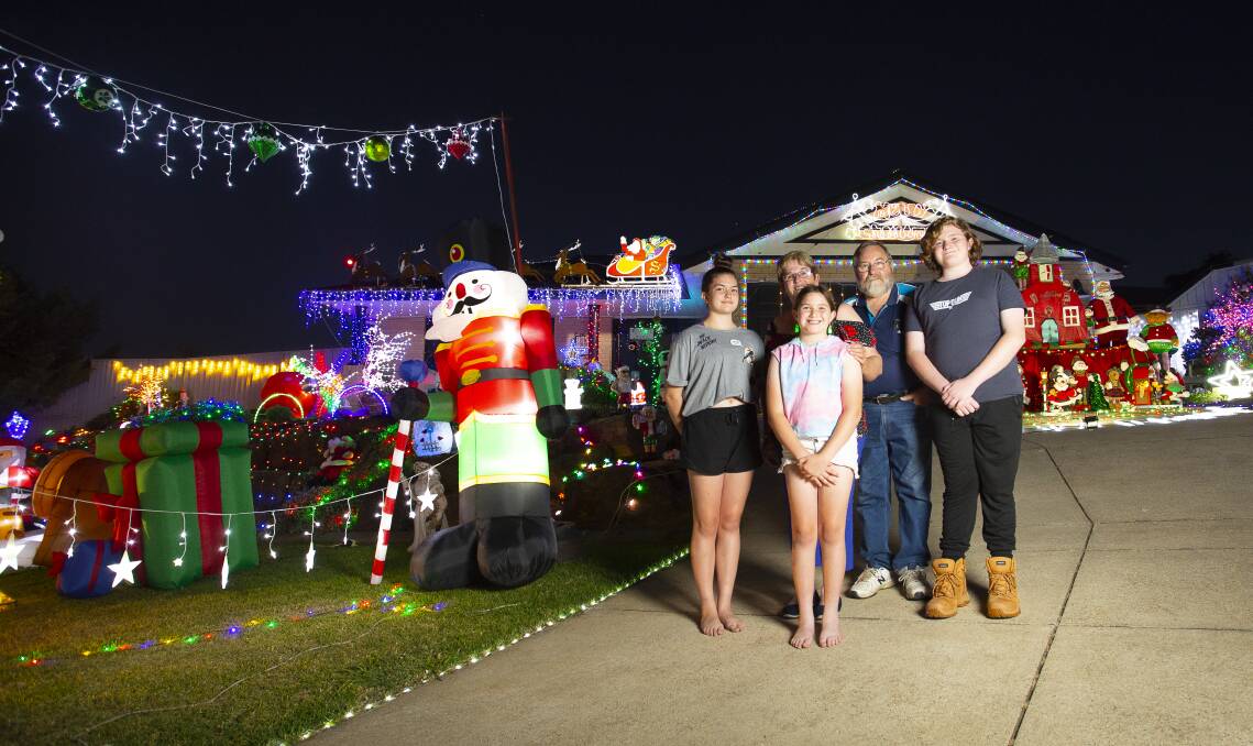 Robert and Shirley O'Brien have gone above and beyond decorating for their grandchildren Bella, Charlotte and Jack Billingham. Picture: Ash Smith
