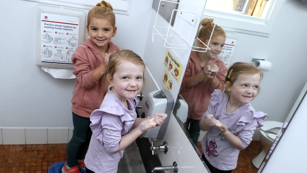 HAND HYGIENE DAY: Sienna Smith and Eva Anderson, both 4, wash their hands for World Hand Hygiene Day at Wagga TAFE's Gumnut Cottage. Picture: Les Smith
