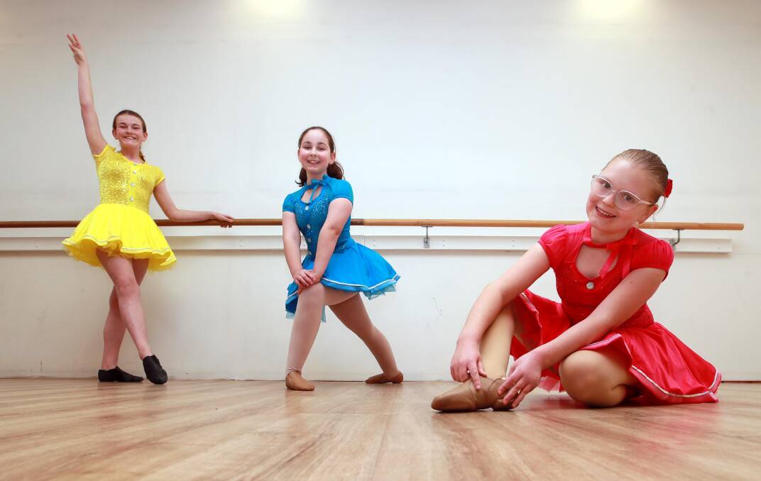 CENTRE STAGE: Eden Smith, 13, Tilly Rumbachs, 11, and Alexa Franke, 12, are excited to be performing in this weekend's Broadway-themed showcase. Picture: Les Smith