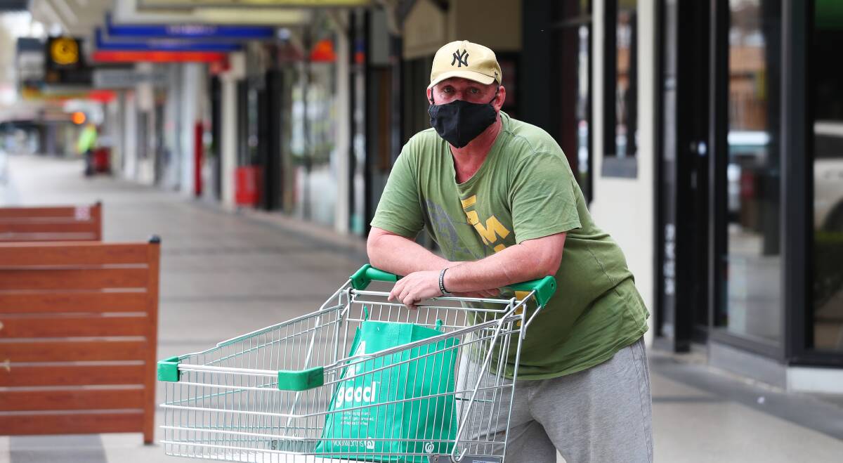 NEW RULES: Locals like Darren Thomas will now be required to wear a face mask when outdoors. Picture: Emma Hillier