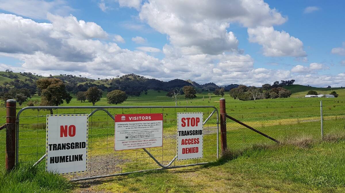 Landholders across the Riverina in the path of TransGrid's proposed HumeLink corridor are attempting to lock the energy giant out by erecting signs on their properties. Picture: Supplied
