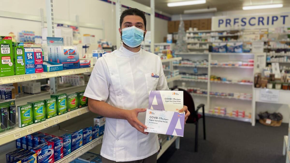 Pharmacist Mina Estafanos at the Forest Hill Pharmacy said their latest shipment of rapid antigen tests sold out in just four hours on Christmas Eve, even with a limit of one per customer. Picture: Emily Wind