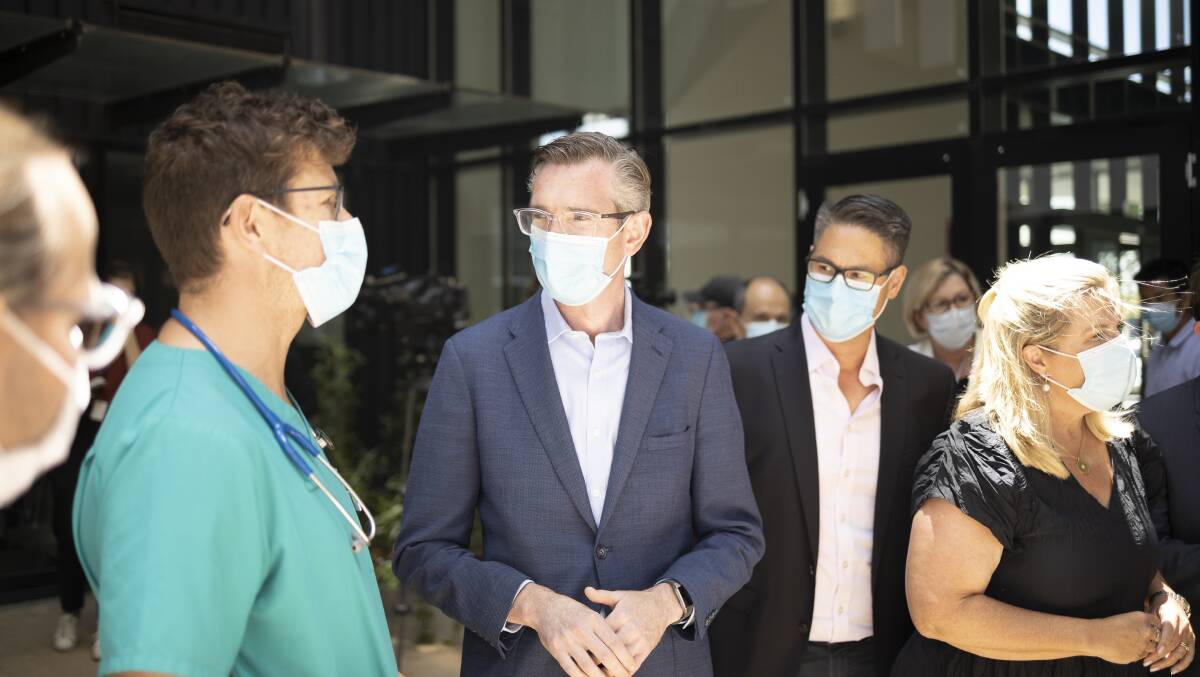 Premier Dominic Perrottet speaking with healthcare workers at Wagga Base Hospital on Tuesday. Picture: Ash Smith