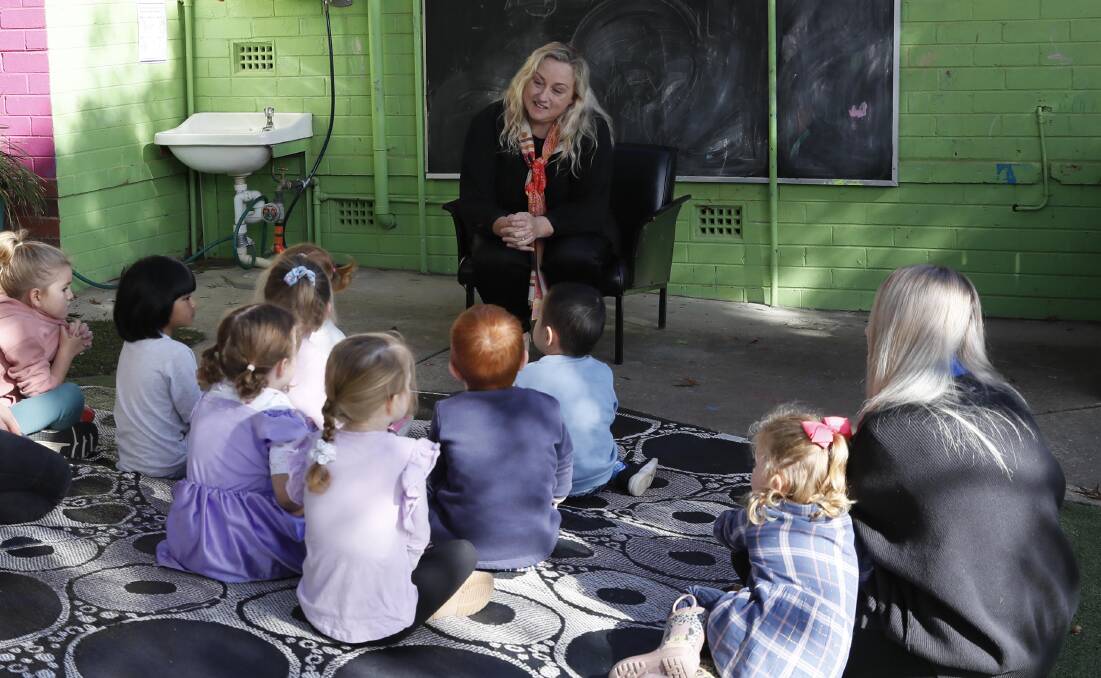 Murrumbidgee Local Health District infection prevention clinical nurse consultant, Mary-Clare Smith, speaks to the children about hand hygiene. Picture: Les Smith