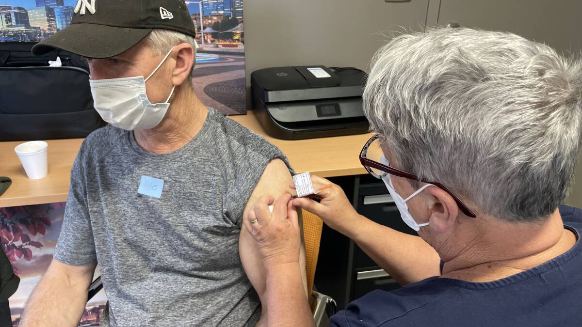 Rick Fitzsimmons received his second dose of the COVID vaccine at the Ngurra Community Centre on Friday. Picture: Emily Wind