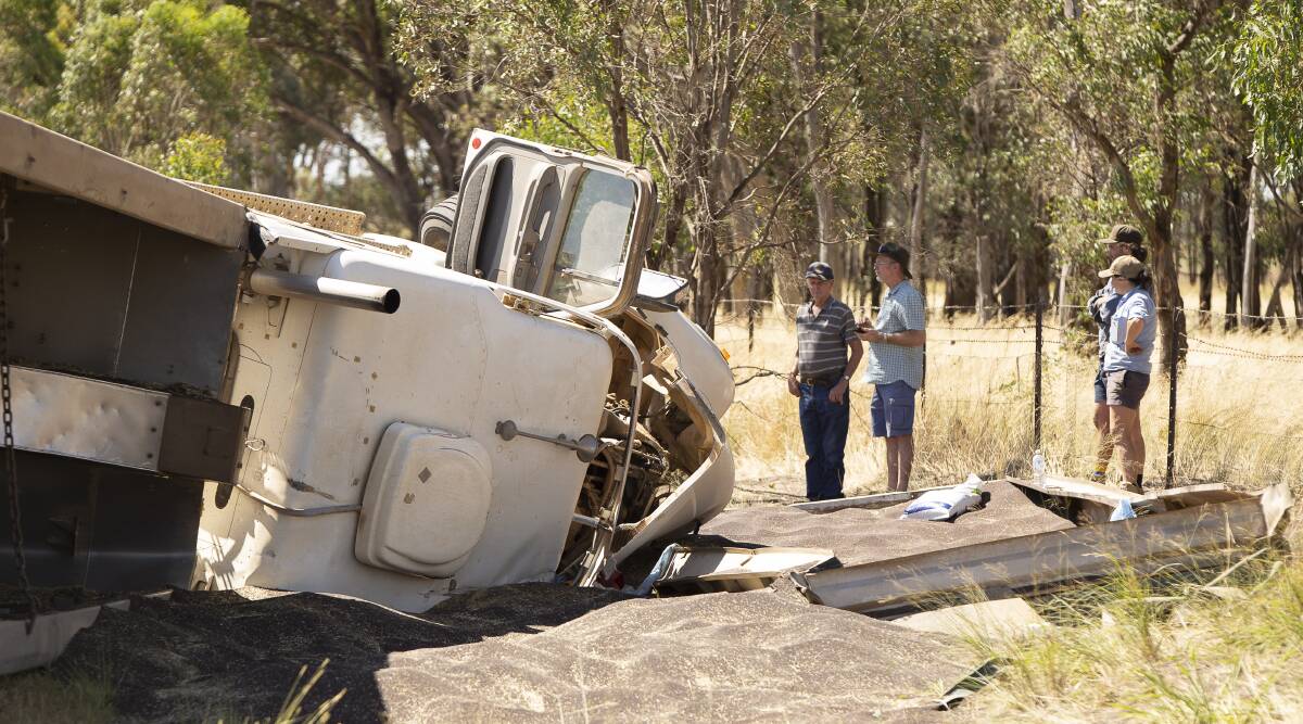 Mangoplah residents were some of the first on scene at a truck rollover on Holbrook Road on Sunday. Picture: Ash Smith