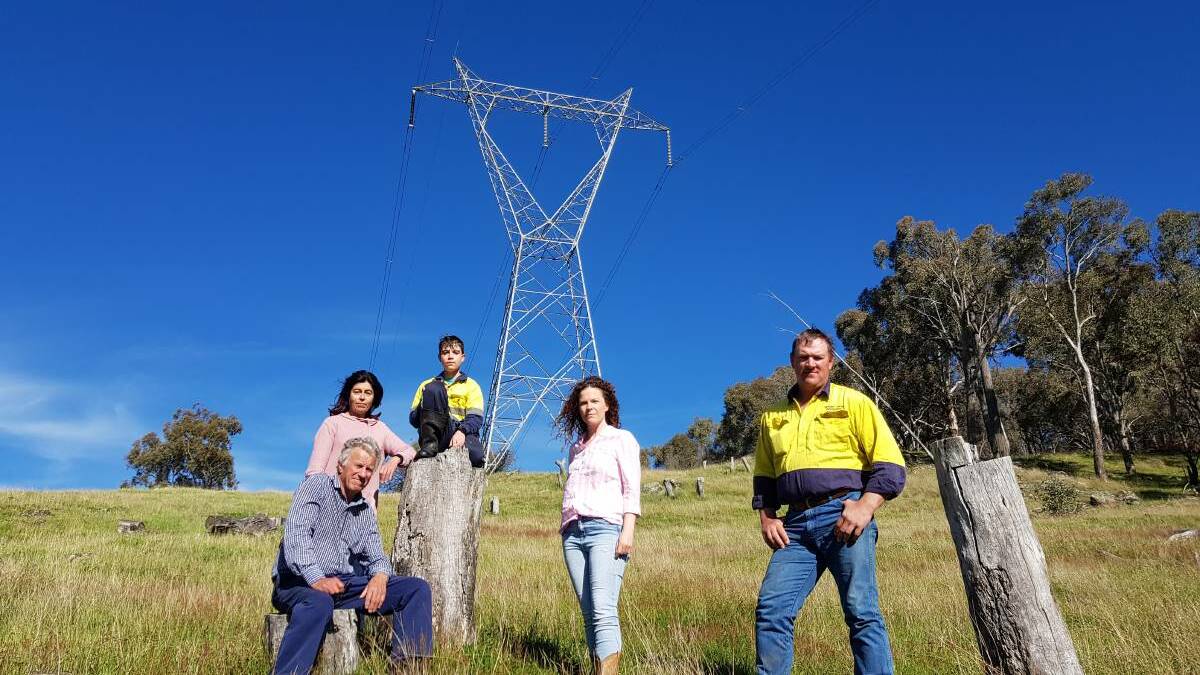 Ross Smith, Pippa Quilty, Eli Quilty-Campbell, Rebecca Tobin and Ian Robson are all opposing the major transmission line project set to be built across their properties. Picture: Supplied