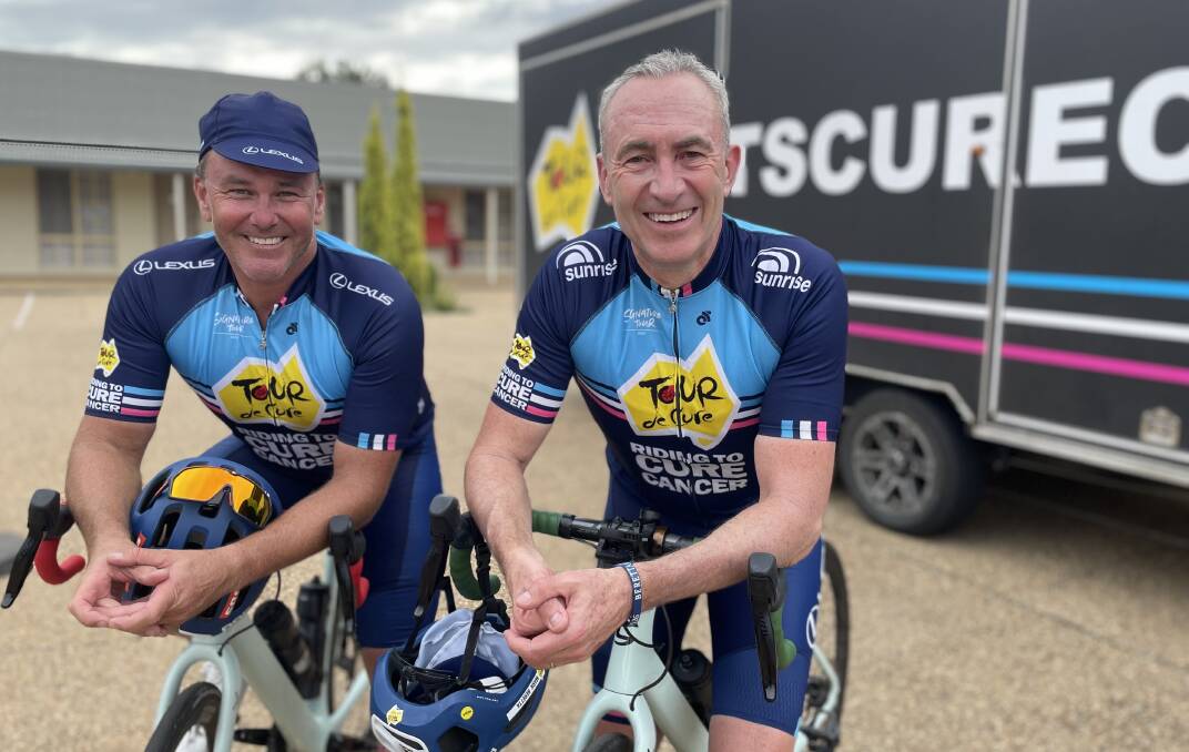 RIDE FOR A CAUSE: Tour de Cure co-founder Geoff Coombs with sports commentator Mark Beretta, who has been a part of the Signature Tour for more than a decade.