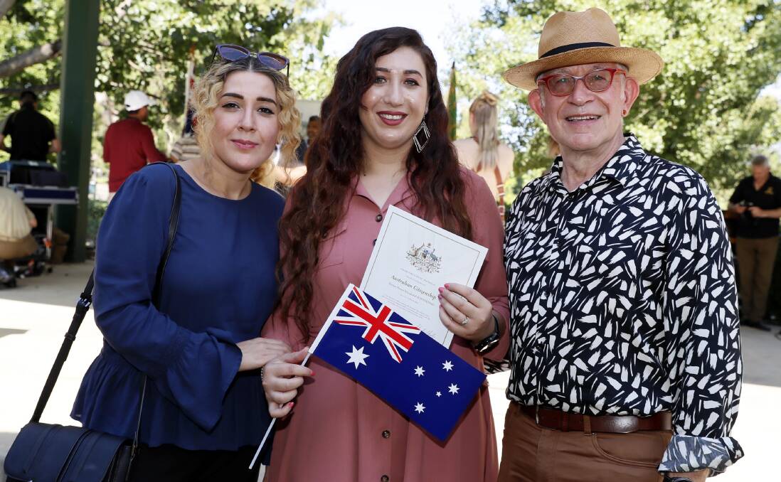 New Aussie citizen Shelan Khodedah with Roya Pouya and David Gilbey. Picture: Les Smith