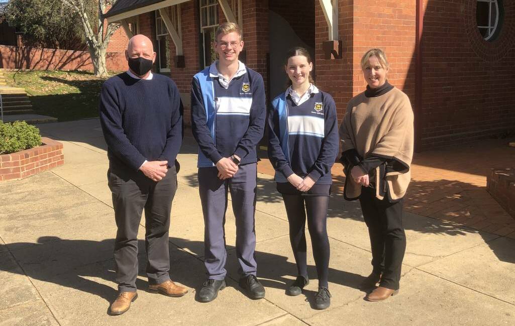 Wagga High Principal Chris Davies with student leaders Lachie Stephens and Lily Stein, and teacher Katrina Smith, earlier this year during the prolonged HSC period.