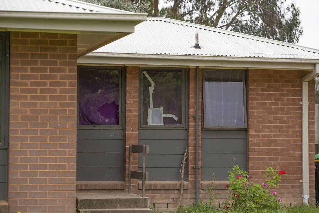 A window was smashed at an Awaba Drive residence in Tolland after an unknown person fired a single shot at the house early on Sunday morning. Picture: Ash Smith