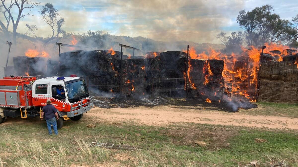 Hay that was burnt during the fire is expected to smoulder for a number of days. Picture: NSW Rural Fire Service