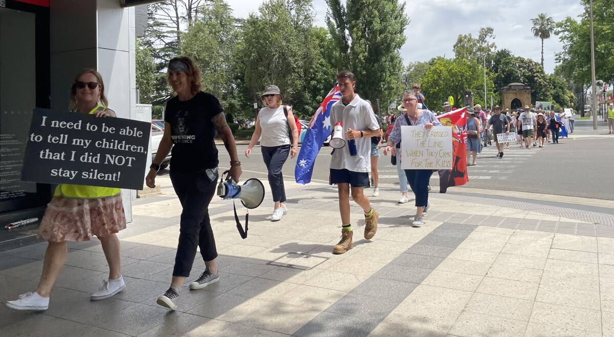 More than 100 protestors took to Baylis Street on Saturday, marching against the government's COVID-19 vaccination mandate. Picture: Emily Wind