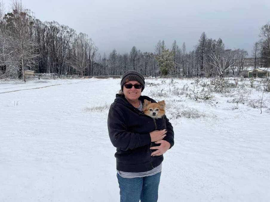 BUCKET LIST: Renee Stent takes her pallative dog Weeman to visit the snow on the weekend, touring around the Snowy Valleys. Picture: Brendan Stent