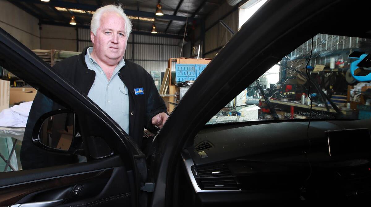 LUKEWARM: You should avoid using hot water on a 'frosty' morning to the clear the ice, says Wagga's Windscreen Doctor owner Neil MacLean. Photo: Les Smith. 