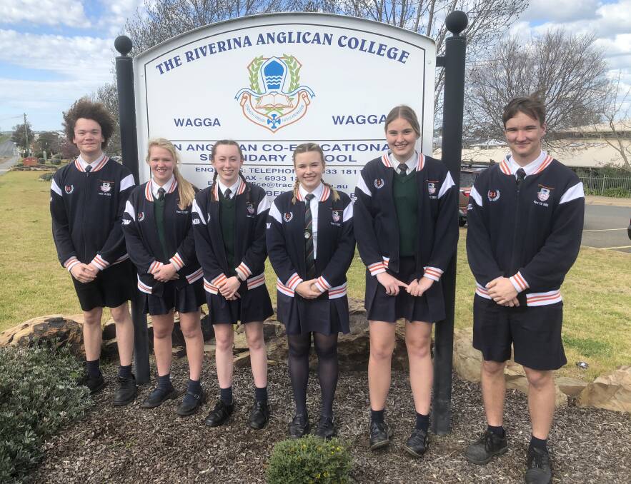 RELIEVED: Riverina Anglican College students Miles Martin, Ciara Wilson, Mia Bowcher, Holly Wilson, Eliza Parker and Hugo Currie have all received early entry offers for university in 2022. Picture: Daniel Heinrich 
