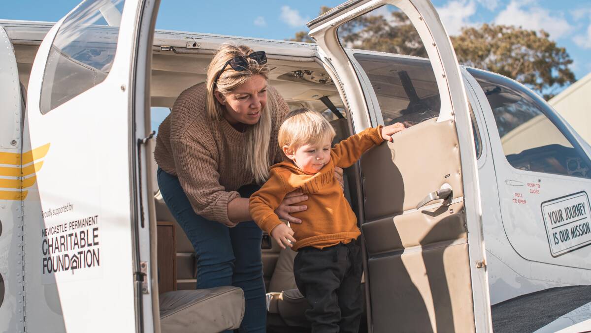 HOMECOMING: Heath Barber arrives home in West Wyalong from his final flight with Little Wings. Heath is pictured with Mum Emily Tooth. Picture: Supplied 
