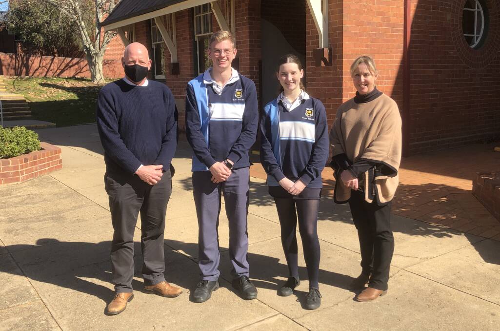 UNITED: Wagga High year 12 students and staff are pushing forward, despite the pandemic placing uncertainty around the HSC. Pictured: Principal Chris Davies, student leaders Lachie Stephens and Lily Stein and teacher Katrina Smith. 