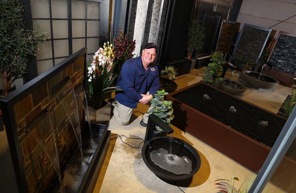 CREATIVE: Craig Absolum pictured with a range of water features he has built. Picture: Emma Hillier