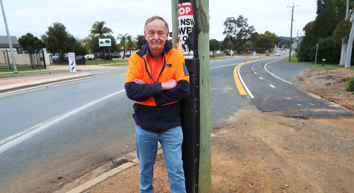 POTENTIAL DANGER: Rob Hibbard is concerned about the safety of motorists at a local roundabout and urged motorists not to follow the 'yellow brick road' which could lead to disaster. Picture: Emma Hillier