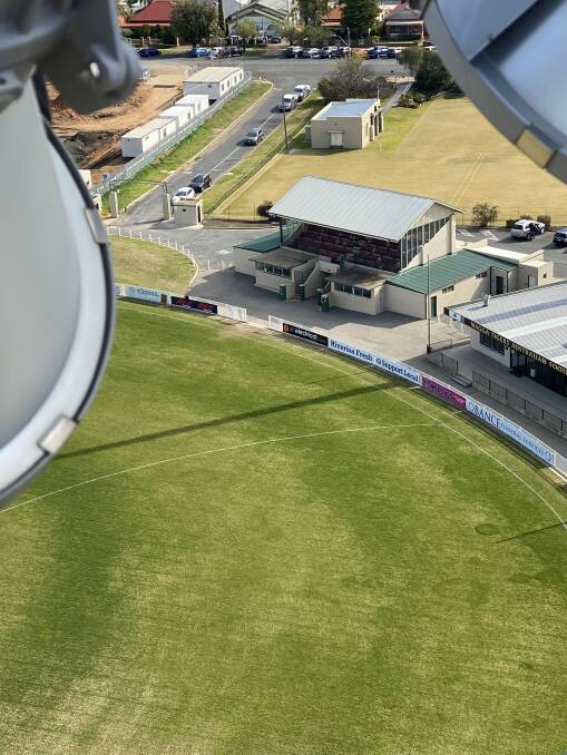 BIRD'S-EYE VIEW: A worker's view of the grandstand at Robertson Oval. Picture: Courtesy of Rob Ellison