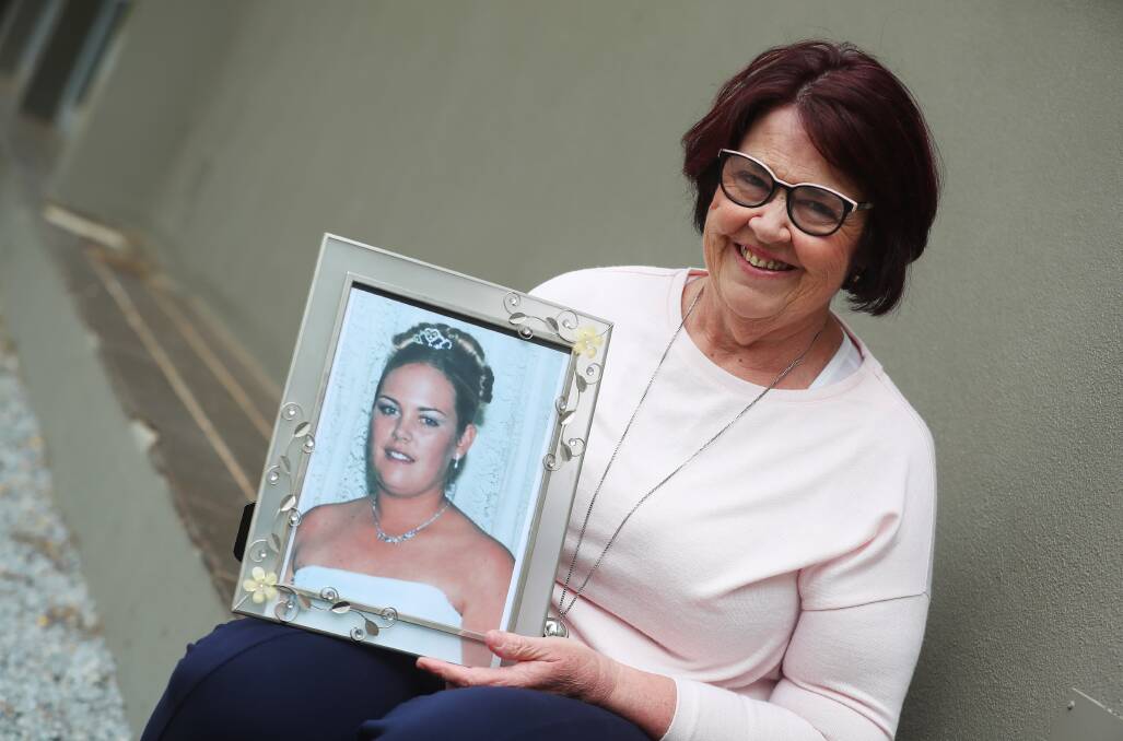 CANCELLATION: Annette St Clair with a picture of her daughter Amie. A ball in memory of Amie was cancelled for the third time due to COVID-19 restrictions. Picture: Emma Hillier 